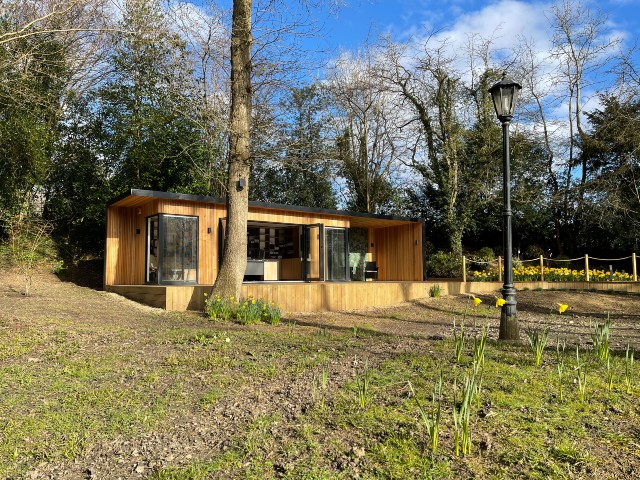 garden room with bridge for access to avoid muddy patches when its raining