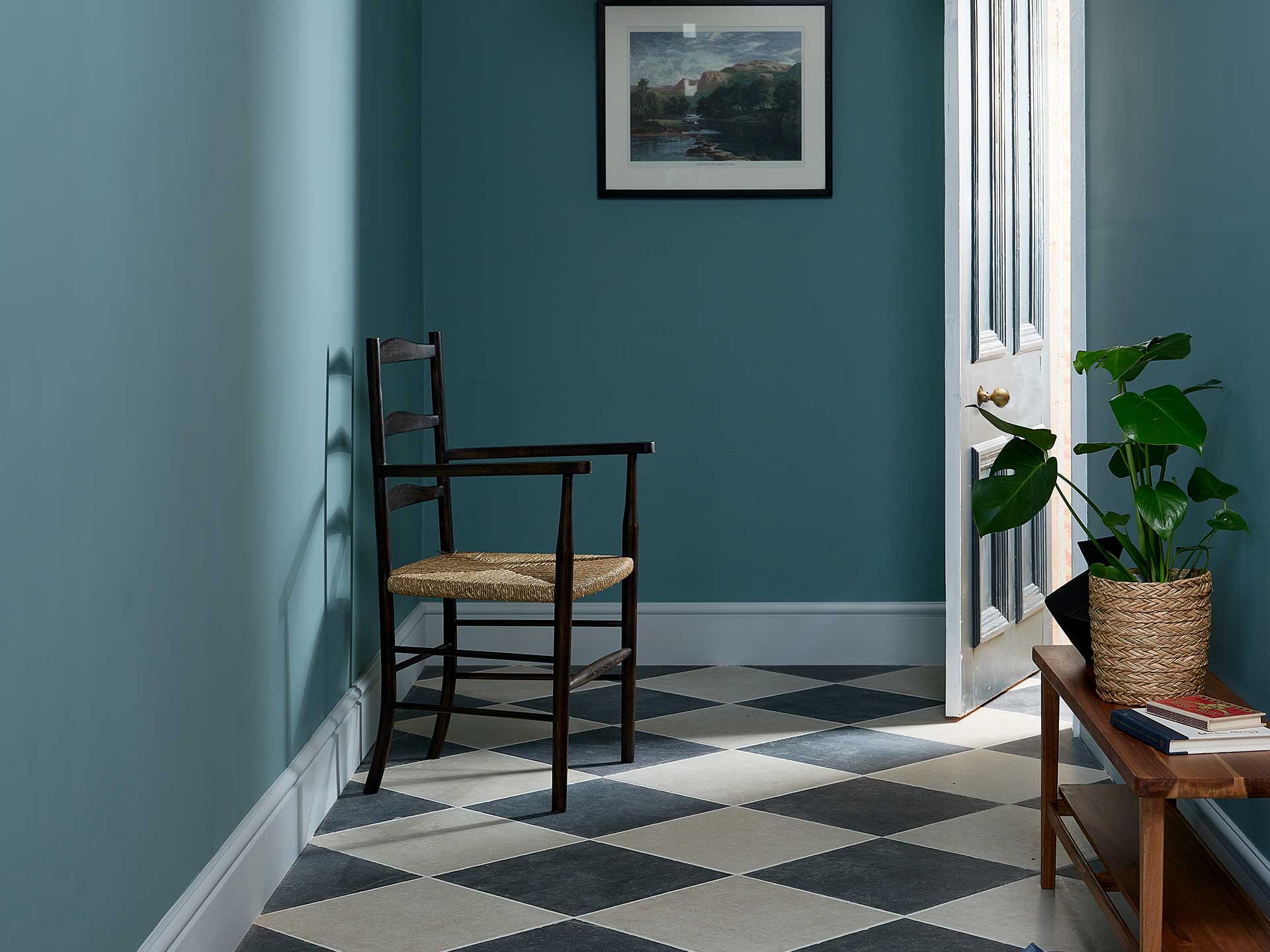 A classic chequerboard tile will bring an elegant look to your entry hall