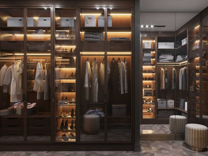 Clear doors is a neat walk-in wardrobe idea for super organisation