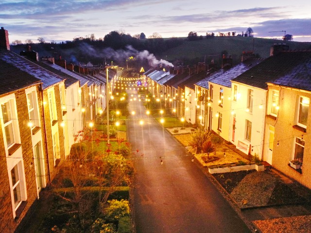 festoon lighting illuminating an entire residential street