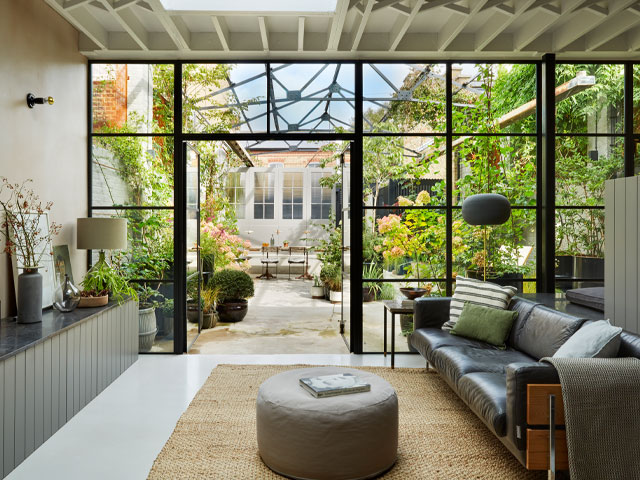 Victorian dairy conversion with large windows. Photo: Darren Chung