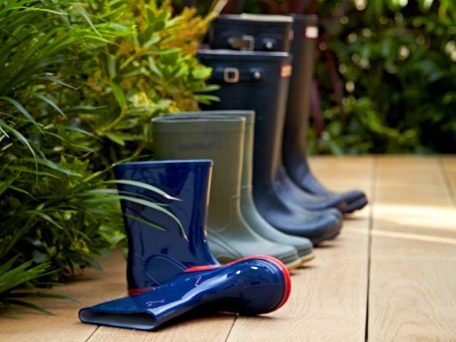 wellies in the garden: hardwearing composite decking is ideal for busy family life