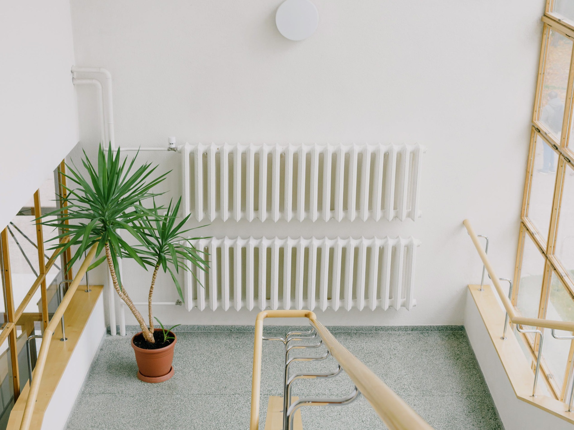 A radiator on the stairs