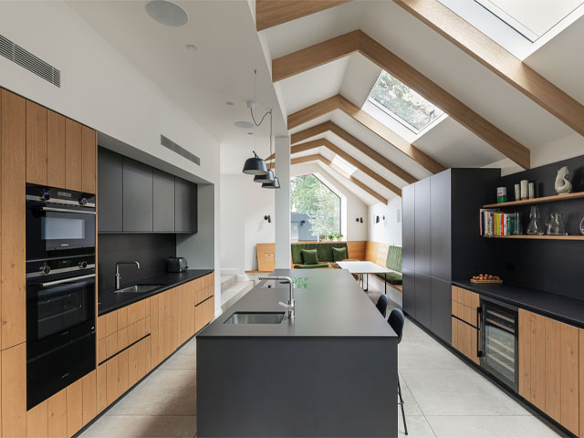 a family home with basement, side and rear extensions making space for a large kitchen extension with pitched roof and dining area