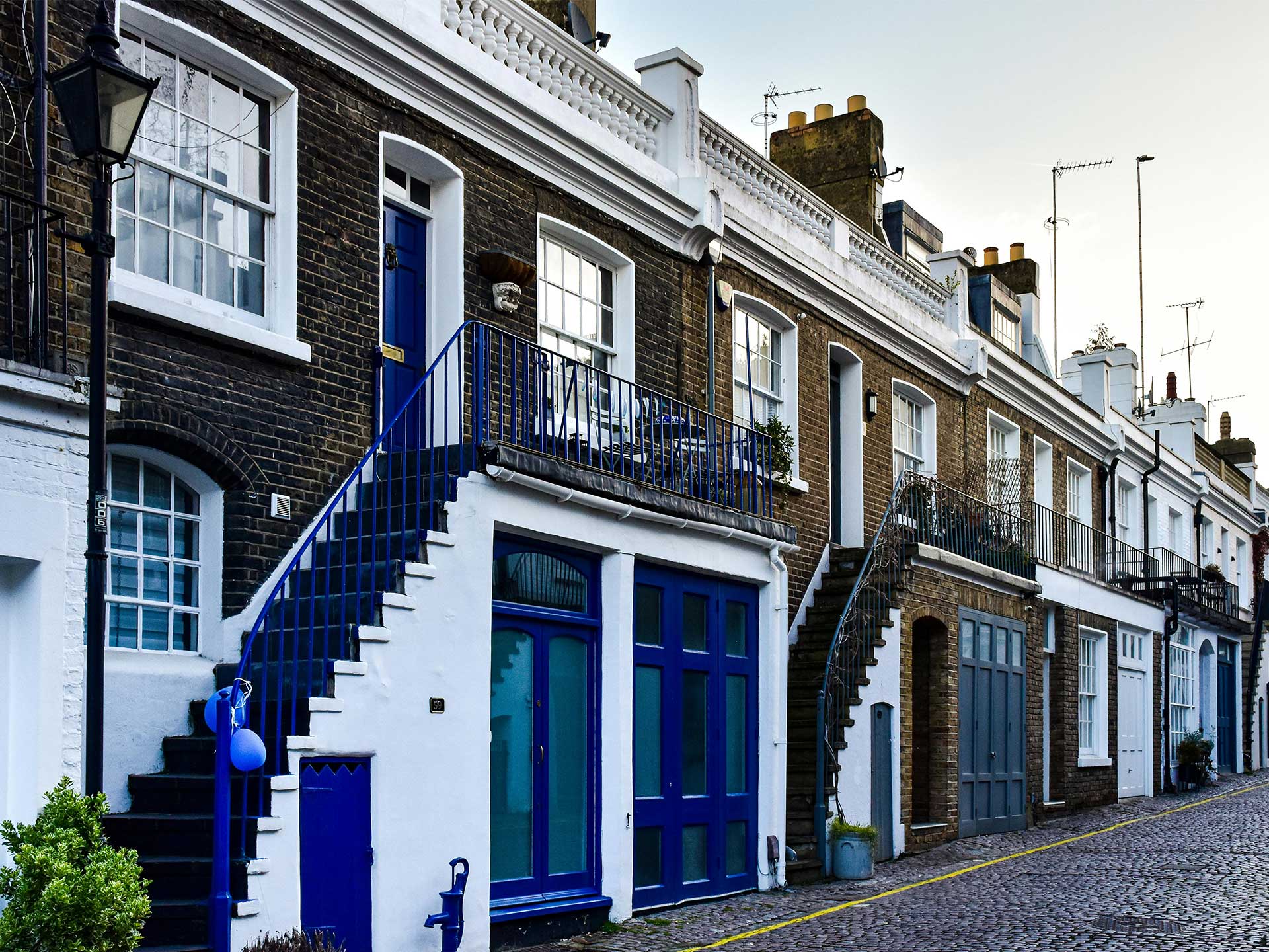 A row of Victorian houses in a London mews