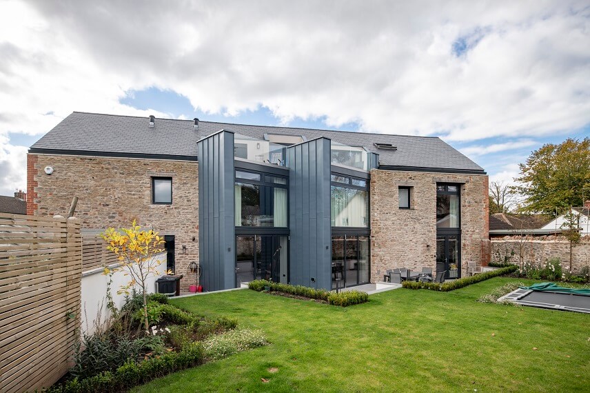 A natural slate roof incorporating six Thermoslate heat collectors for hot water. These are seamlessly integrated, so you can't tell them from the slate.